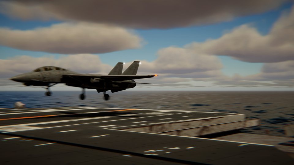 An F-14 Tomcat catches the wire on the carrier deck